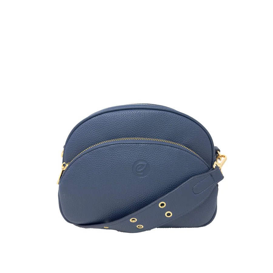Blue handbag with gold accents on a white background - okotoks hc pharmacy