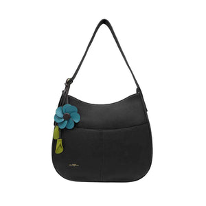 Black handbag with a blue flower accessory on a white background - okotoks hc pharmacy