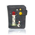 Gray pouch with a lighthouse and dog illustration on a white background - okotoks hc pharmacy