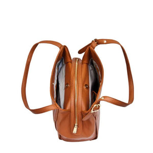 Brown leather backpack with gold zipper on a white background - okotoks hc pharmacy