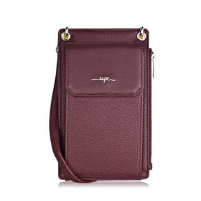 Purple crossbody bag with a visible brand logo on a white background - okotoks hc pharmacy