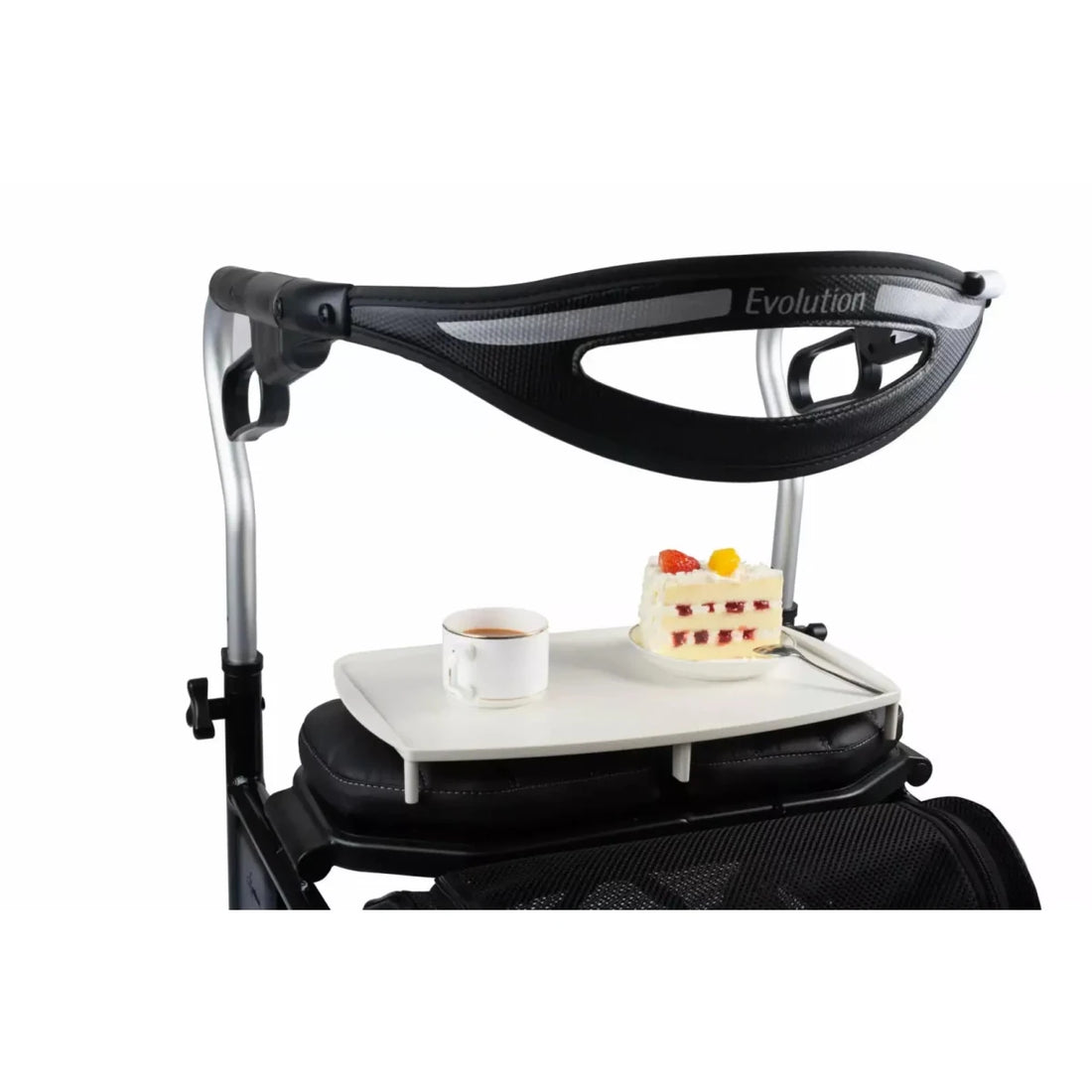Black and silver tray with a white surface holding a cup and a small cake, branded 'Evolution'. - okotoks hc pharmacy
