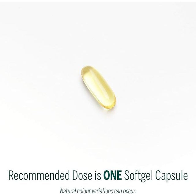 Yellow softgel capsule on a white background with text indicating the recommended dose. - okotoks hc pharmacy