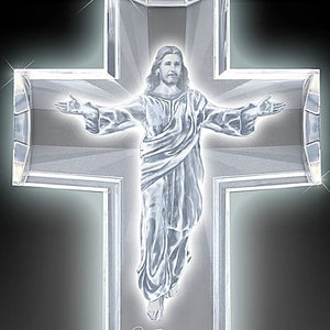 Cross with a figure of Jesus in the center on a dark background - okotoks hc pharmacy