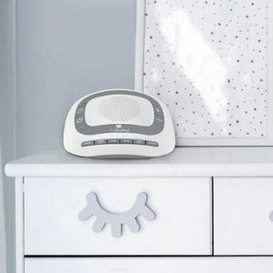 Baby monitor on a white dresser with a polka dot blanket in the background - okotoks hc pharmacy