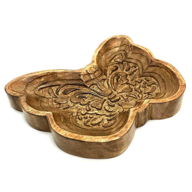 Wooden tray with intricate design on a white background - okotoks hc pharmacy