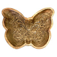 Wooden butterfly-shaped object with intricate carvings on a white background - okotoks hc pharmacy