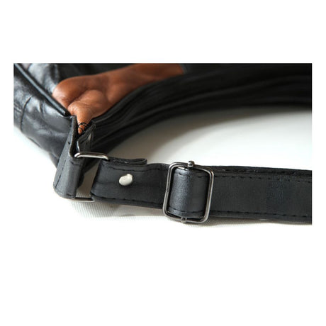 Close-up of a black leather belt with a silver buckle on a white background - okotoks hc pharmacy