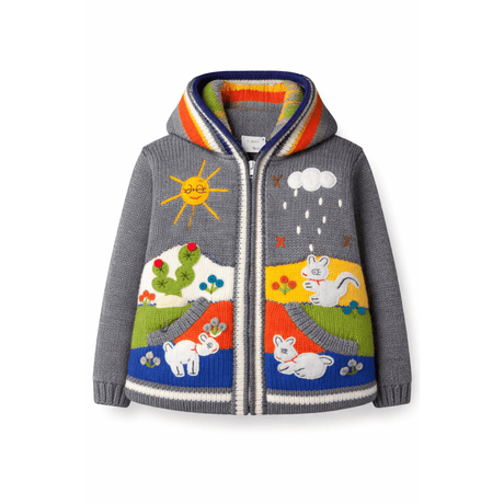 Children's sweater with colorful designs on a white background - okotoks hc pharmacy
