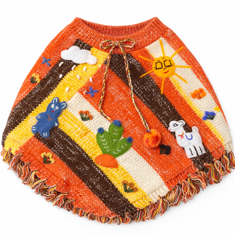 Colorful knitted poncho with desert-themed designs on a white background - okotoks hc pharmacy