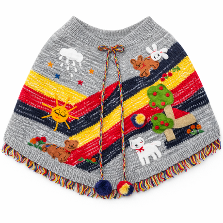 Colorful knitted poncho with animal designs on a white background - okotoks hc pharmacy