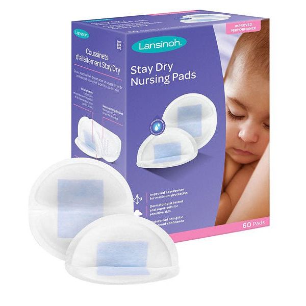 Lansinoh Stay Dry Nursing Pads packaging with nursing pads displayed in front on a white background - okotoks hc pharmacy