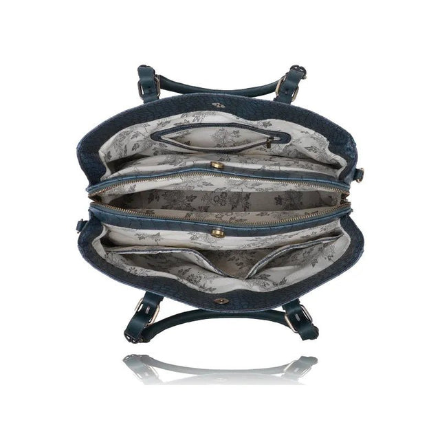 Open blue handbag with floral patterned interior on a white background - okotoks hc pharmacy