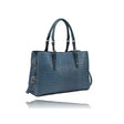 Blue textured handbag on a white background - okotoks hc pharmacy
