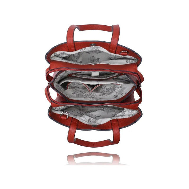 Red leather handbag with floral interior lining on a white background - okotoks hc pharmacy