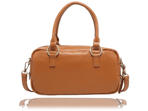 A tan leather handbag with double top handles, gold-tone hardware, and a detachable shoulder strap, shown against a plain white background with a soft reflection below. - okotoks hc pharmacy
