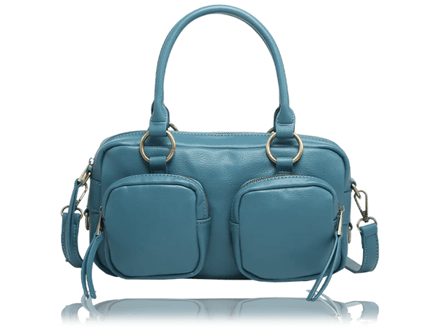 A teal blue leather handbag with dual top handles, two front zippered pockets, and gold-tone hardware, shown on a white background with a faint reflection below. - okotoks hc pharmacy