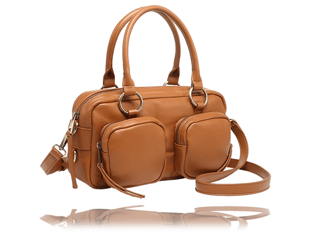 A tan leather handbag with dual top handles, a detachable shoulder strap, and multiple front zippered pockets, shown on a white background with a reflection below. - okotoks hc pharmacy