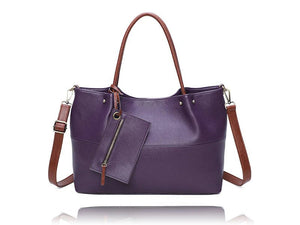 Purple handbag with brown straps on a white background - okotoks hc pharmacy