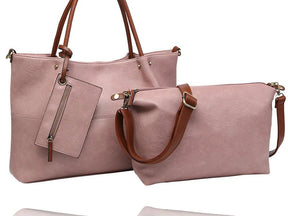 A dusty pink faux-leather tote bag with brown leather handles and a matching zippered pouch, displayed on a clean white background. - okotoks hc pharmacy
