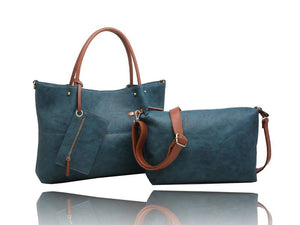 A matching two-piece handbag set consisting of a large tote bag and a smaller zippered pouch, both in a textured teal blue material with brown faux-leather handles and straps, displayed on a reflective white surface. - okotoks hc pharmacy