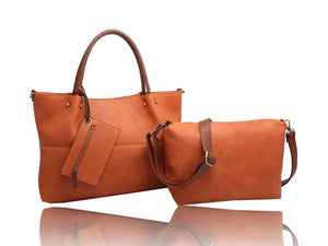 Brown leather handbag and clutch on a white background - okotoks hc pharmacy