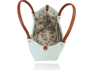 Light blue handbag with brown handles and floral interior on a white background - okotoks hc pharmacy