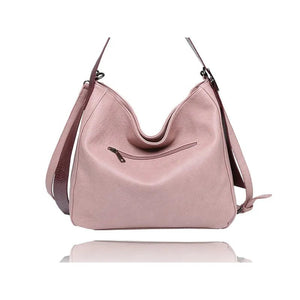 Pink handbag with a strap on a white background - okotoks hc pharmacy