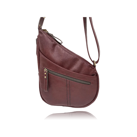 A wine leather shoulder bag with a diagonal zip closure, a front zippered pocket, and a matching leather strap, shown against a plain white background with a subtle reflection. - okotoks hc pharmacy