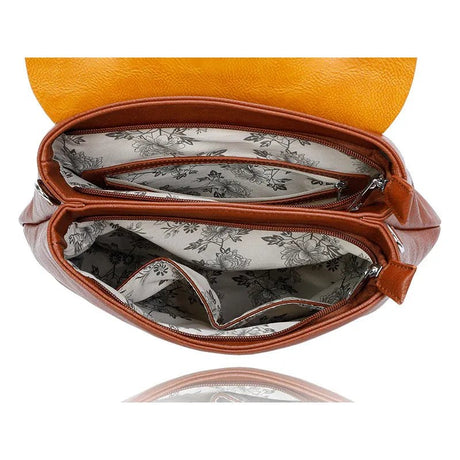 Open brown leather bag with floral lining on a white background - okotoks hc pharmacy