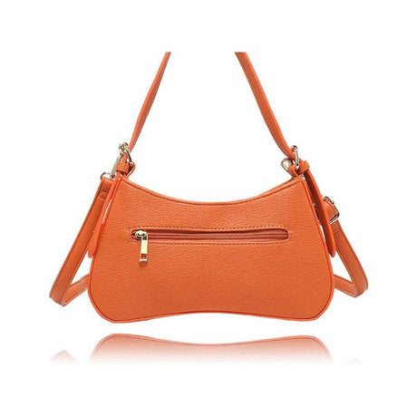 An orange pebbled faux-leather shoulder bag with a curved crescent shape, featuring a front zippered pocket with a gold-tone zipper pull and a matching adjustable shoulder strap, shown on a white background with a reflection below. - okotoks hc pharmacy