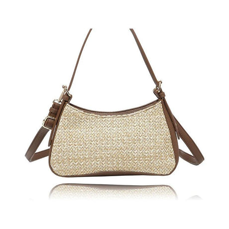 A woven straw shoulder bag with brown leather trim and straps, shown against a plain white background with a subtle reflection. - okotoks hc pharmacy