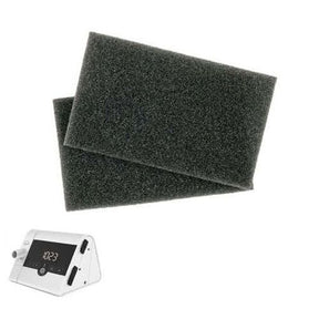 Two black foam filters on a white background with a cpap machine - okotoks hc pharmacy