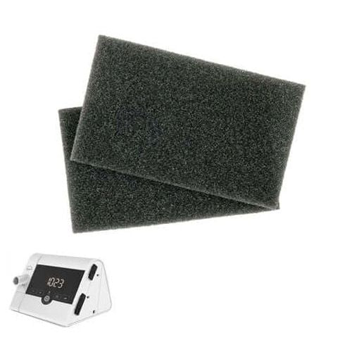 Two black foam filters on a white background with a cpap machine - okotoks hc pharmacy