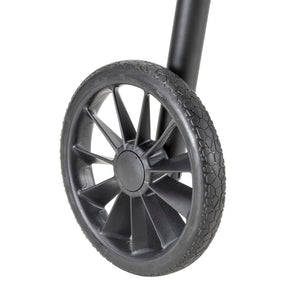 Close-up of a black wheel with tread pattern on a white background - okotoks hc pharmacy