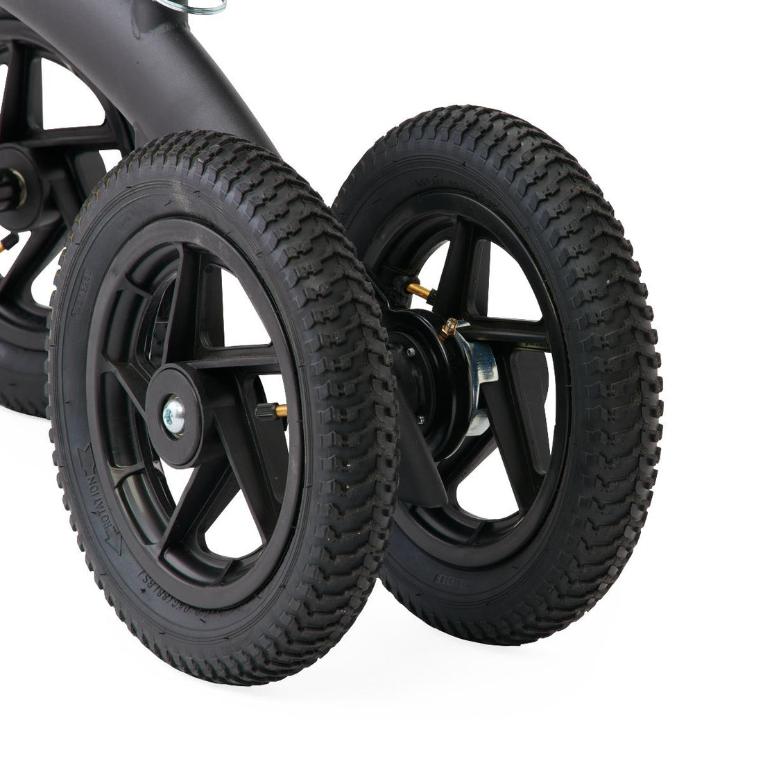 Close-up of black wheels on a knee walker with a white background - okotoks hc pharmacy