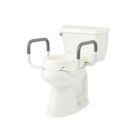 White toilet with a raised seat and gray handles on a white background - okotoks hc pharmacy