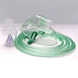 Clear plastic oxygen mask with green tubing on a white background - okotoks hc pharmacy