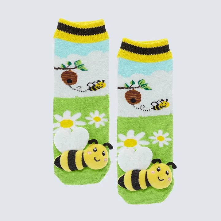 Children's socks with bee and flower design on a light blue background - okotoks hc pharmacy