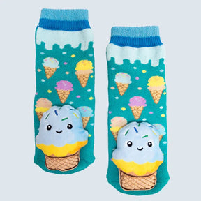 Pair of socks with ice cream cone design on a light blue background - okotoks hc pharmacy