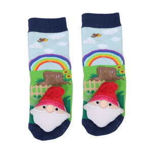 A pair of children's crew socks featuring a colorful garden gnome design with a red hat, white beard, and a rainbow landscape on a white background. - okotoks hc pharmacy