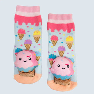 Pair of socks with ice cream cone design on a light blue background - okotoks hc pharmacy