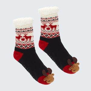 Pair of black socks with red and white pattern and reindeer design on a light gray background - okotoks hc pharmacy