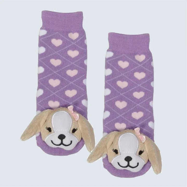Pair of purple socks with dog faces and heart patterns on a light blue background - okotoks hc pharmacy