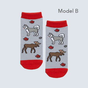 Pair of socks with husky and moose design on a light gray background - okotoks hc pharmacy