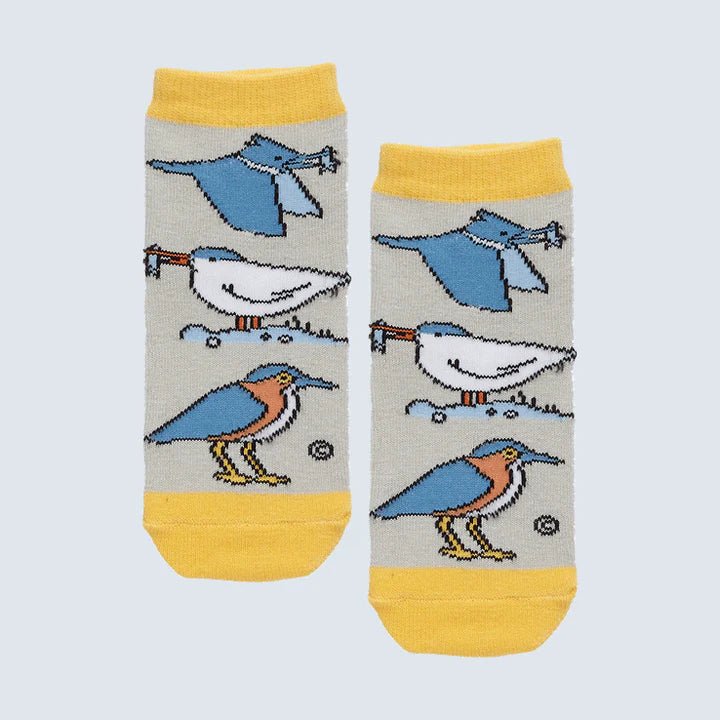 Pair of socks with bird designs on a light gray background - okotoks hc pharmacy