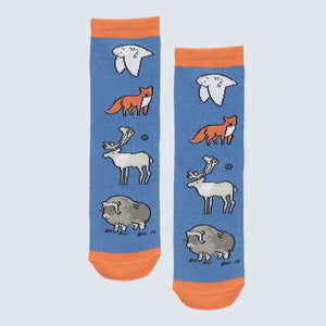 Pair of socks with animal patterns on a light blue background - okotoks hc pharmacy