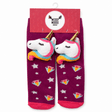 A pair of children's socks in magenta-purple with plush unicorn heads, colorful diamond motifs, and white stars, attached to a pink retail hanger card labeled 'Messy Moose Socks'. - okotoks hc pharmacy