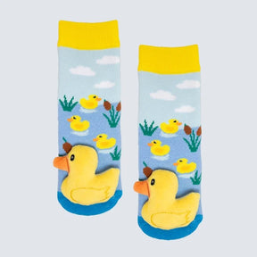 Pair of socks with rubber duck design on a light blue background - okotoks hc pharmacy