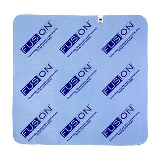 Blue Fusion Chair underpad with repeated logo on a white background - okotoks hc pharmacy